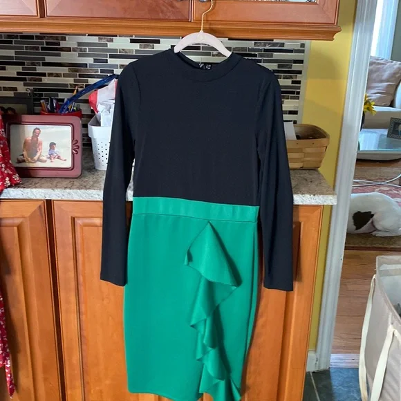 Black top/ emerald green bottom never worn Black top/ emerald green bottom never worn
